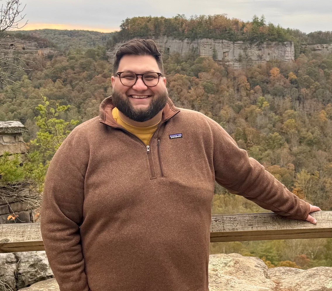 Joshua Friling smiling outdoors